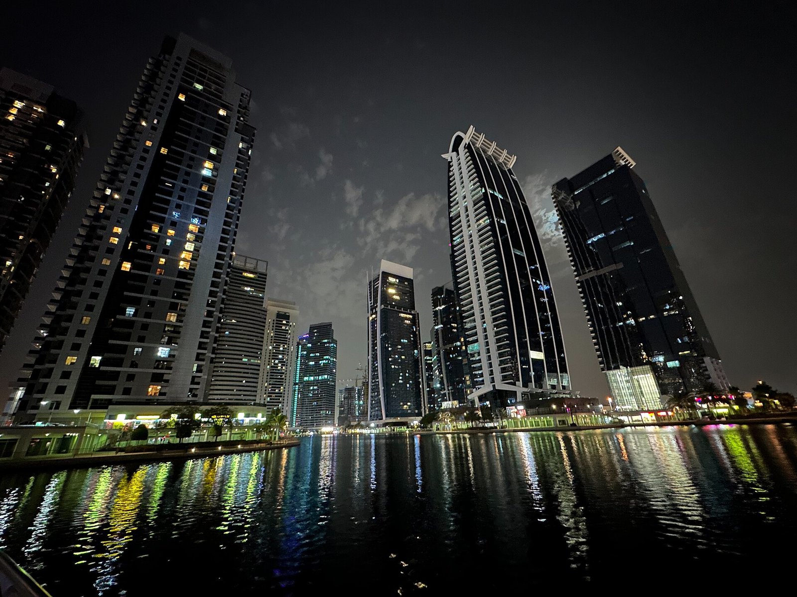 Jumeirah Lake Towers and lakes at night, Dubai